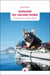 Nomade du grand nord - en kayak avec un chien eskimo